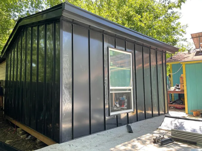 Black standing seam metal wall panels for Roof Inspection in Kingfisher